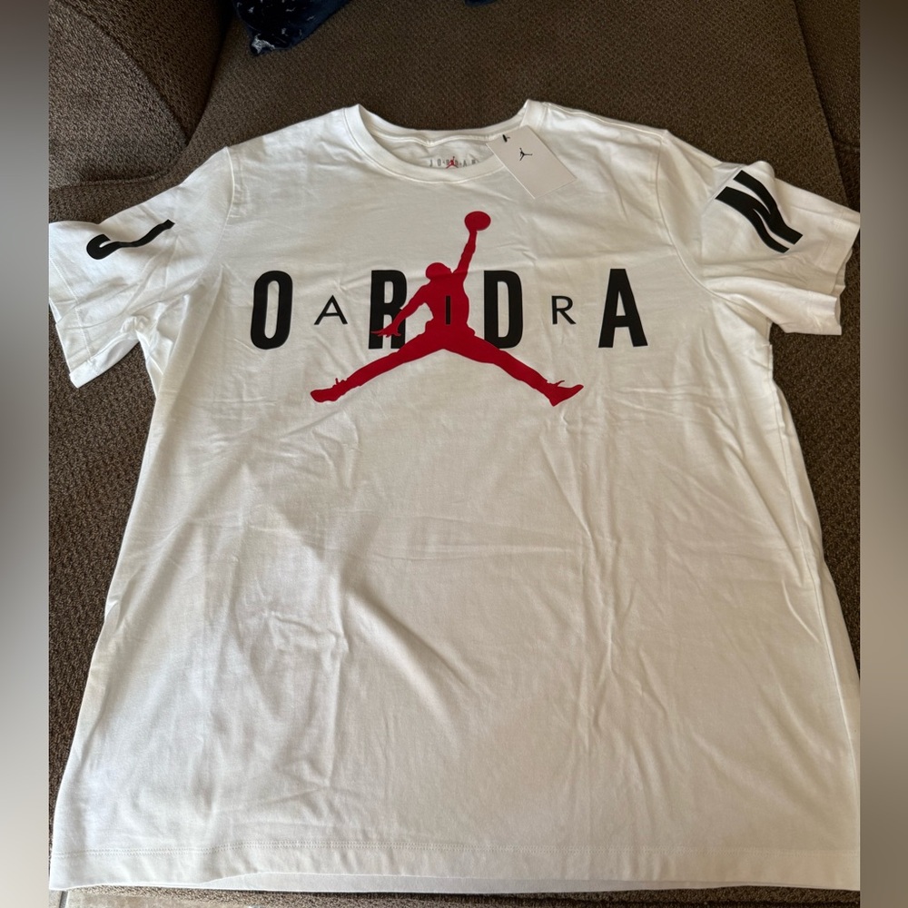 Jordan White Tee with Logo Going Across Shirt